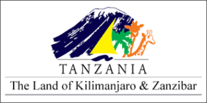 Tanzania logo featuring a stylized Mount Kilimanjaro, giraffe, and sailboat. Text reads: "Tanzania - The Land of Kilimanjaro & Zanzibar.